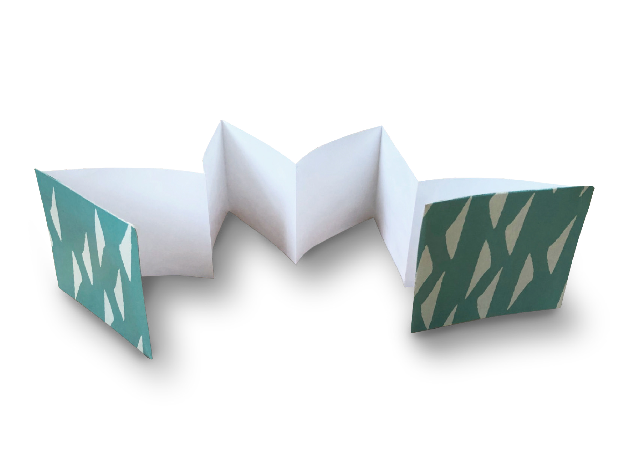 Detailed step for making a folded paper book.